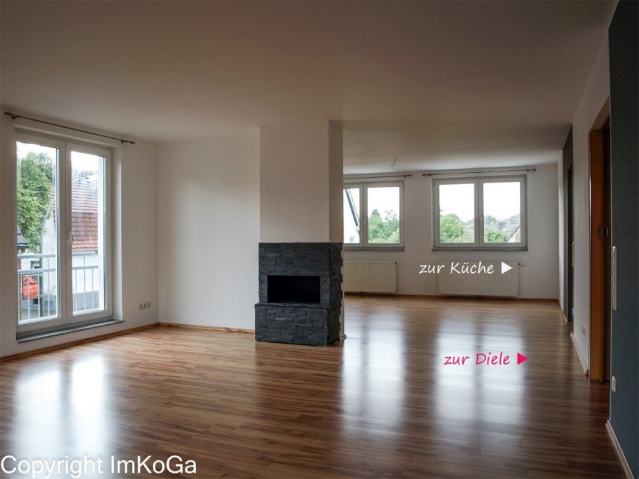 9568 beschr Wohnraum mit Kami Etagenwohnung Marl